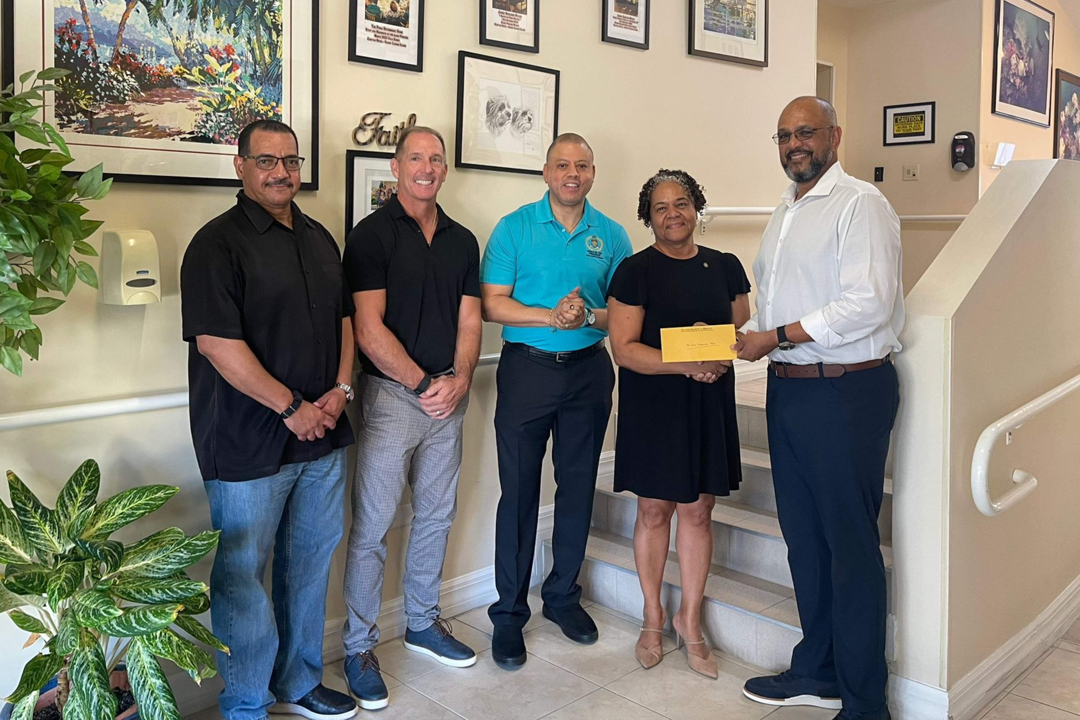 From Left to Right: Minister Rolston Anglin for Finance & Economic Development and Education & Training, Scott Somerville – Pines Board Chairman, Premier Andre Ebanks, Lynda Mitchell – Chief Executive Officer Pines, and Minister Isaac Rankine for Social Development & Innovation